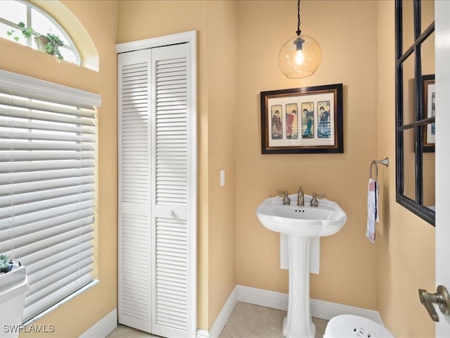 bathroom featuring tile patterned flooring