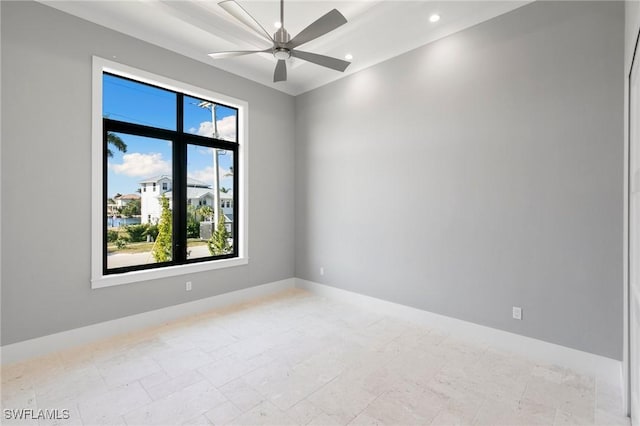 unfurnished room with ceiling fan