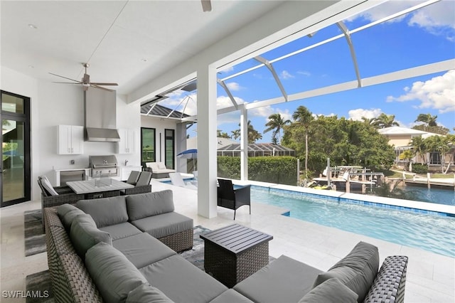 exterior space with a ceiling fan and a sunroom