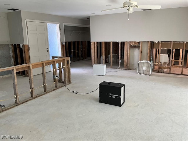 interior space featuring ceiling fan