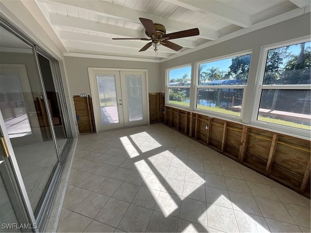 unfurnished sunroom featuring ceiling fan, french doors, beamed ceiling, a water view, and wood ceiling