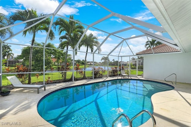 view of pool with a lanai and a patio