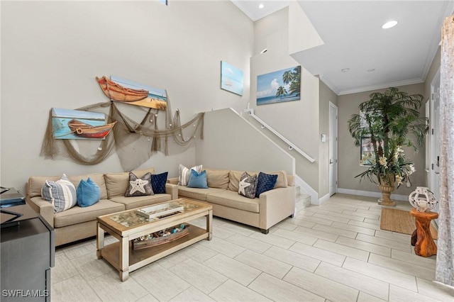 living room featuring crown molding