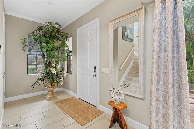 tiled entryway with crown molding