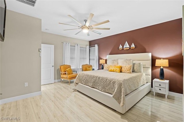 bedroom featuring ceiling fan and hardwood / wood-style floors