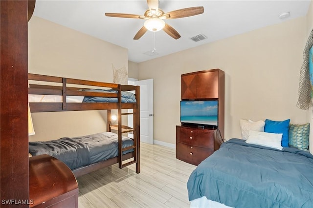 bedroom featuring ceiling fan and light hardwood / wood-style flooring