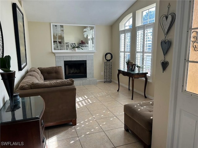 tiled living room with a fireplace