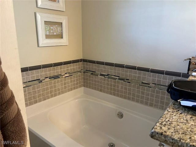 bathroom featuring a washtub