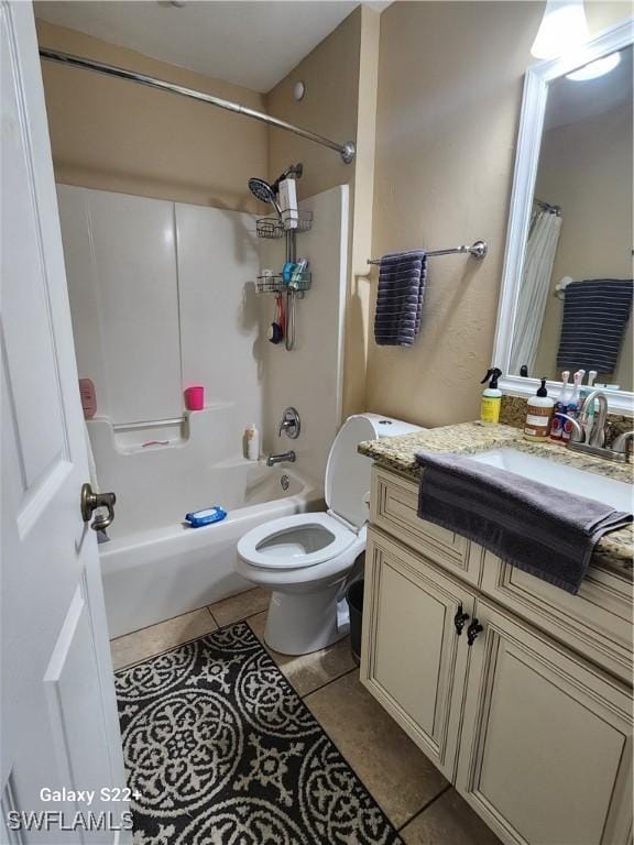 full bathroom with shower / tub combo with curtain, vanity, toilet, and tile patterned flooring