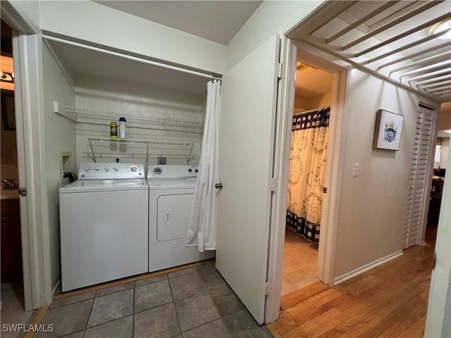 laundry room with washing machine and dryer