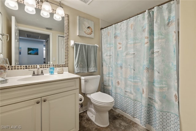 full bathroom with vanity, toilet, and shower / bath combo with shower curtain