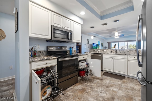 kitchen featuring ceiling fan, sink, white cabinets, and appliances with stainless steel finishes