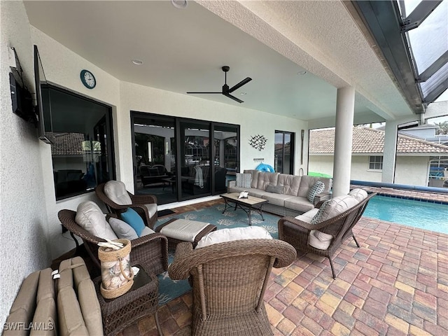 view of patio with ceiling fan and outdoor lounge area