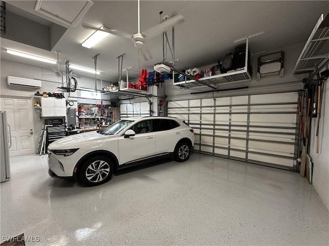 garage with stainless steel fridge, a wall mounted AC, and a garage door opener