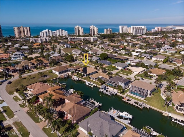 bird's eye view with a water view