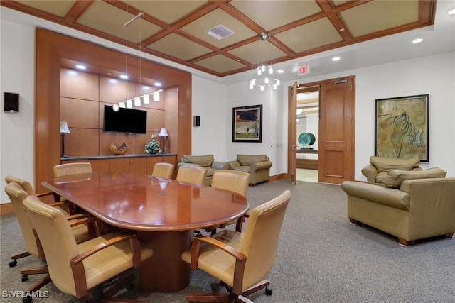 carpeted dining room with a notable chandelier and coffered ceiling