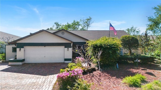 single story home featuring a garage