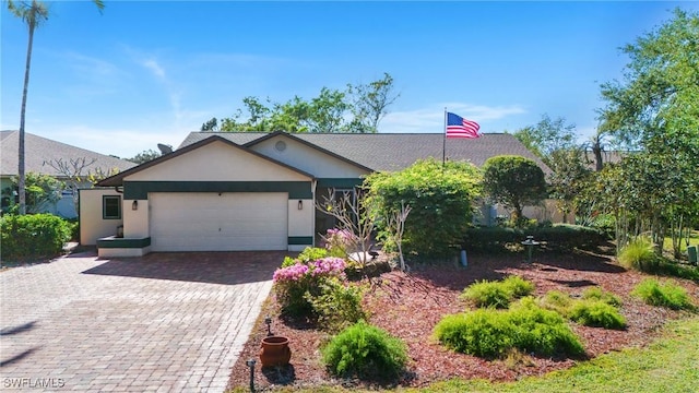 single story home with a garage