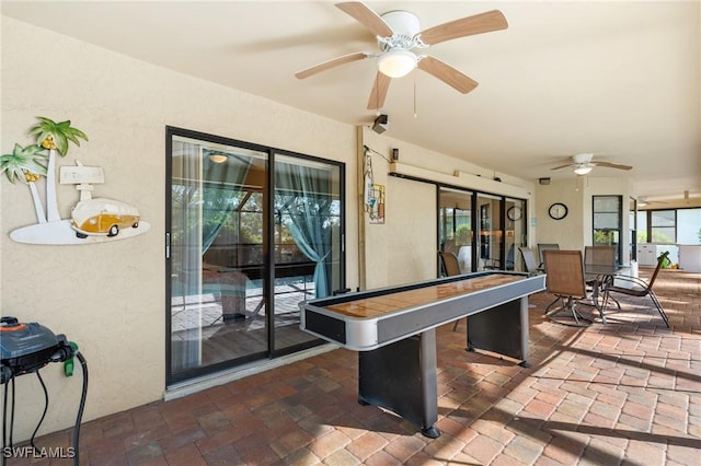 game room with ceiling fan