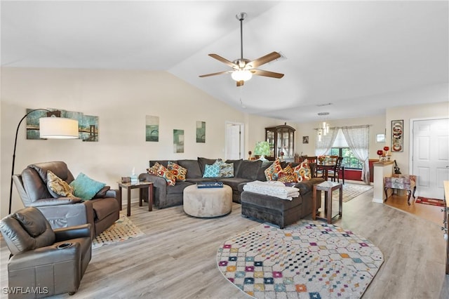 living room featuring light hardwood / wood-style flooring, ceiling fan, and lofted ceiling