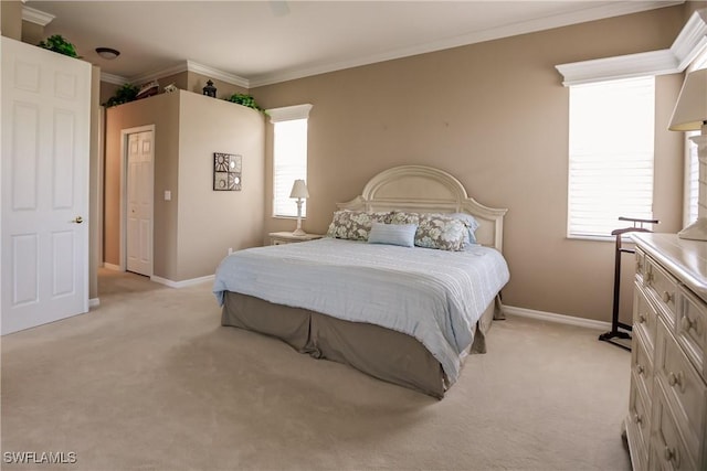 carpeted bedroom featuring ornamental molding