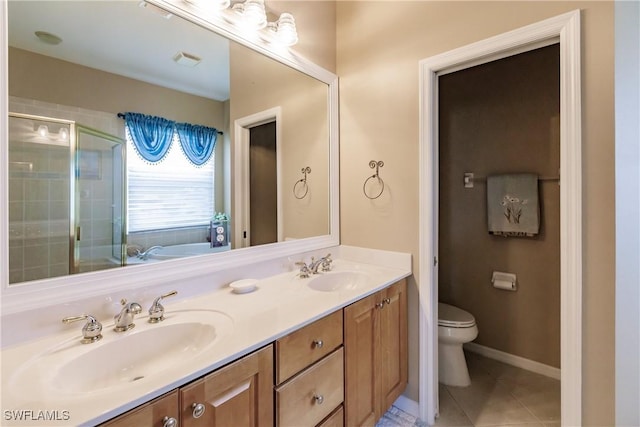 full bathroom featuring toilet, tile patterned flooring, independent shower and bath, and vanity