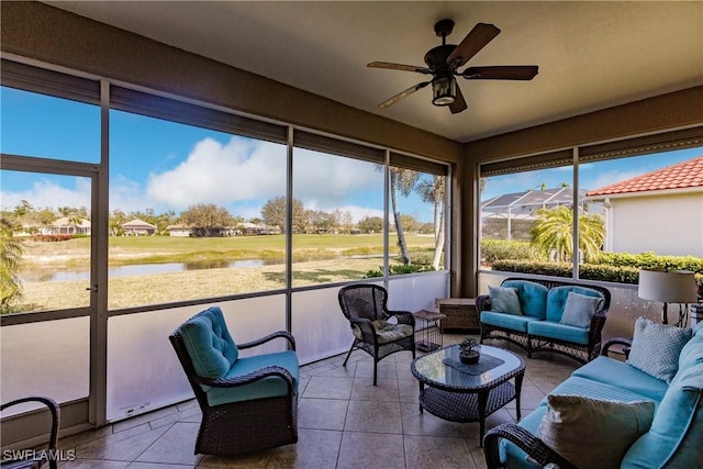 sunroom / solarium with ceiling fan