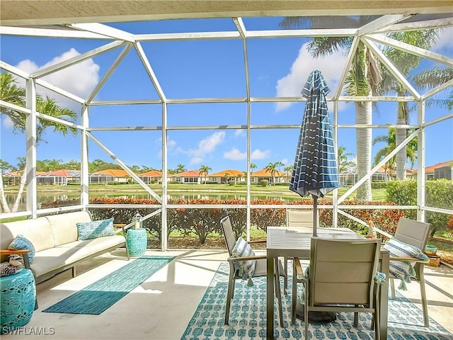 unfurnished sunroom featuring a residential view