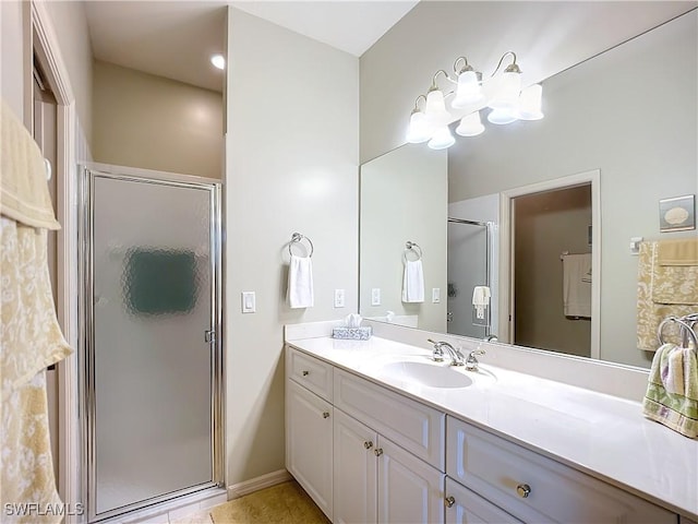 full bath with a shower stall and vanity