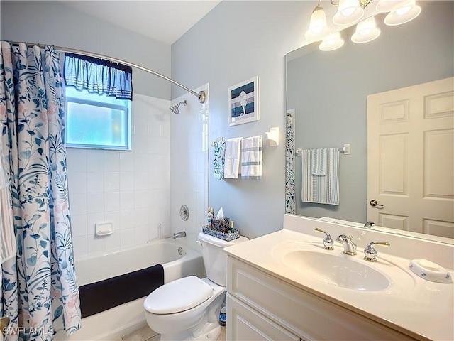 full bath with toilet, shower / bath combination with curtain, and vanity