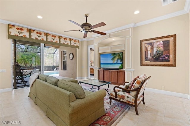 tiled living room featuring ceiling fan and ornamental molding