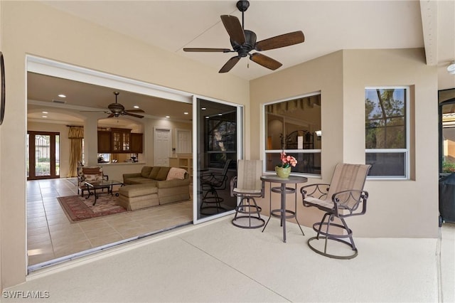 view of patio with ceiling fan