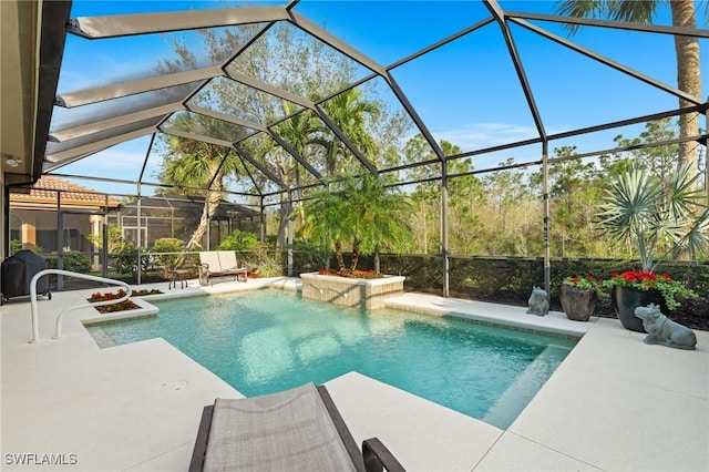 view of swimming pool with glass enclosure and a patio