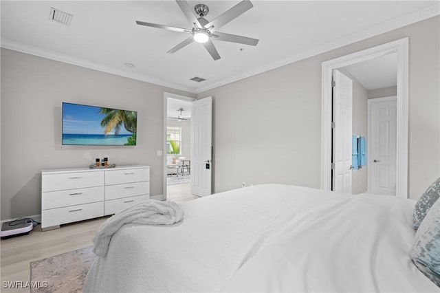 bedroom with ceiling fan, ornamental molding, and light hardwood / wood-style floors