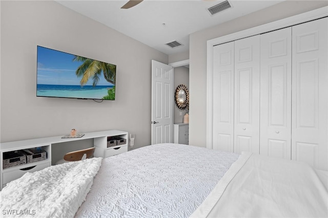 bedroom featuring ceiling fan and a closet