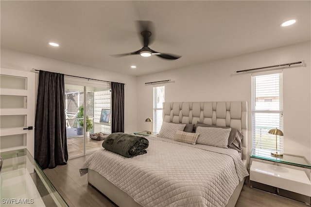 bedroom with access to outside, ceiling fan, and wood-type flooring