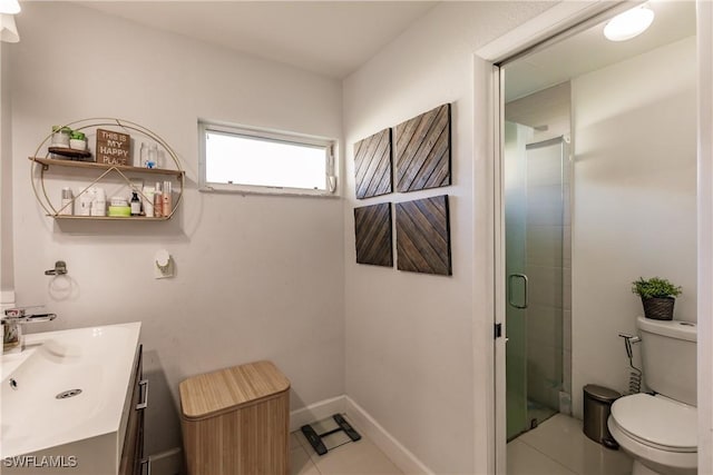 bathroom featuring tile patterned flooring, an enclosed shower, vanity, and toilet