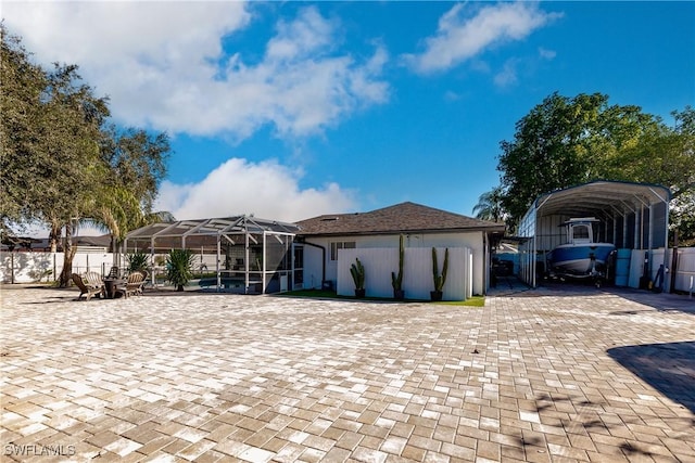 view of front of property featuring a carport