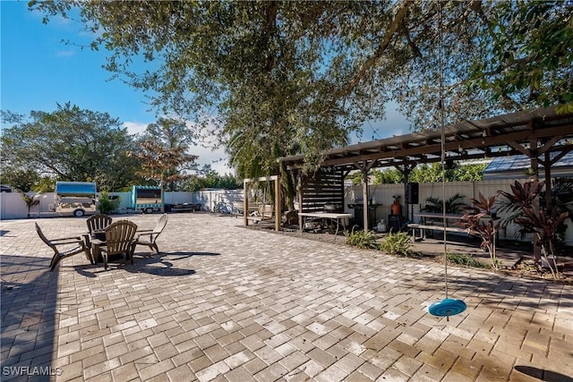 view of patio featuring a pergola