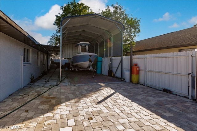 view of parking / parking lot with a carport