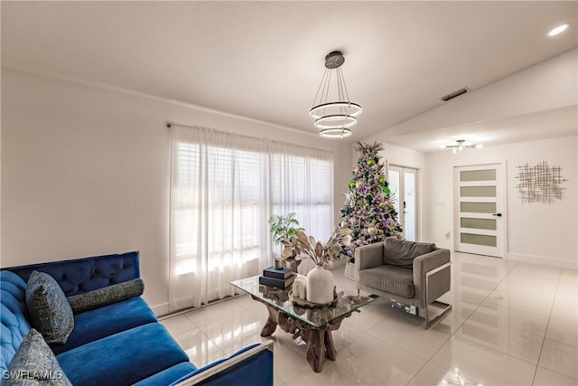 tiled living room featuring vaulted ceiling