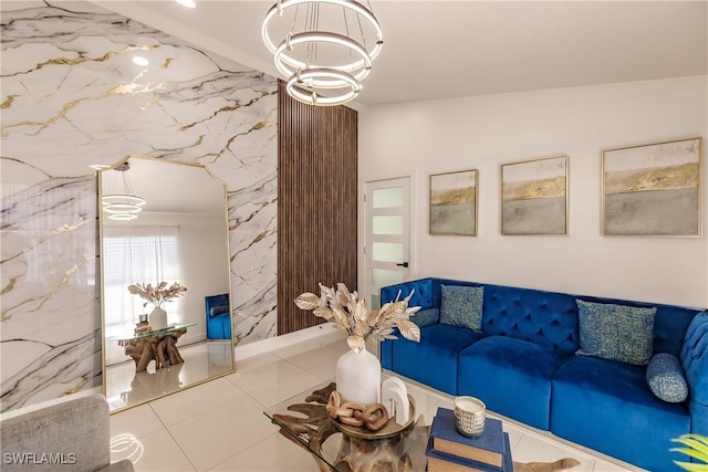 living room with lofted ceiling, tile patterned flooring, and a notable chandelier