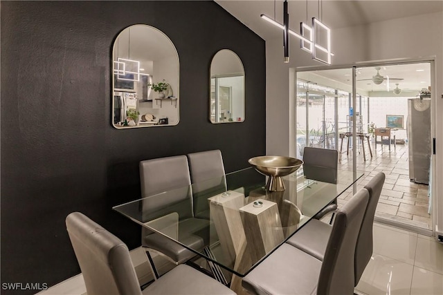 dining room featuring ceiling fan