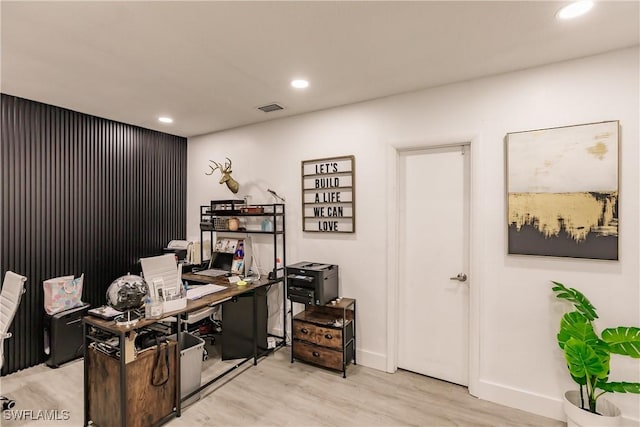 home office featuring light hardwood / wood-style floors