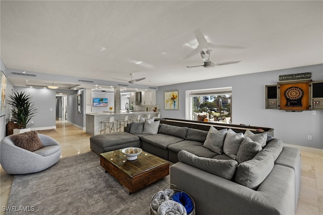 living room with ceiling fan