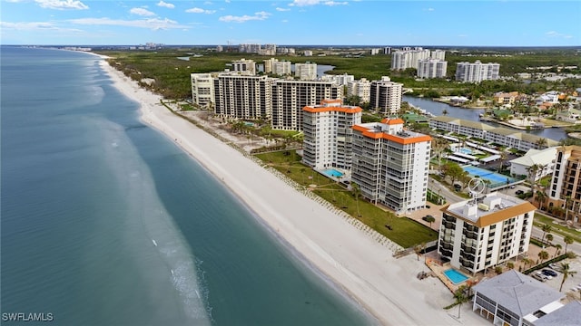 bird's eye view with a view of the beach and a water view