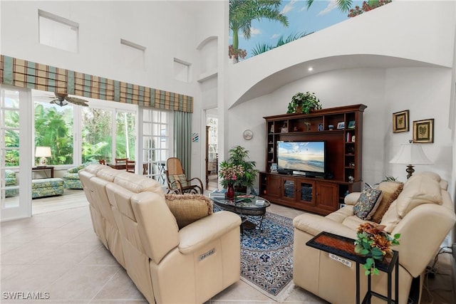 tiled living room with a high ceiling