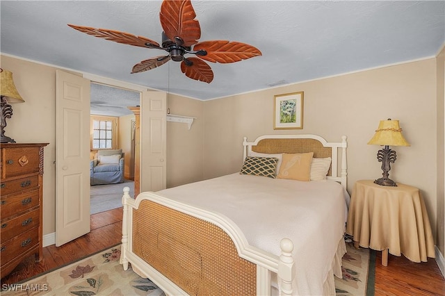 6253 Valeria Rd, Bokeelia, FL 33922 - bedroom featuring wood-type flooring and ceiling fan