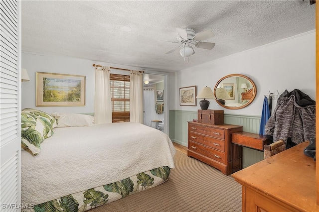 6253 Valeria Rd, Bokeelia, FL 33922 - bedroom featuring ceiling fan, light carpet, and a textured ceiling