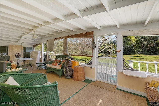 6253 Valeria Rd, Bokeelia, FL 33922 - sunroom / solarium featuring beamed ceiling, ceiling fan, and a healthy amount of sunlight